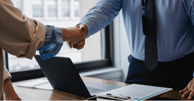 two people shaking hands